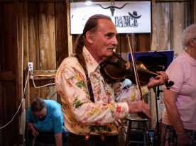 Earl Pardini (of the Slide Mountain String Band) also called dances while fiddle playing